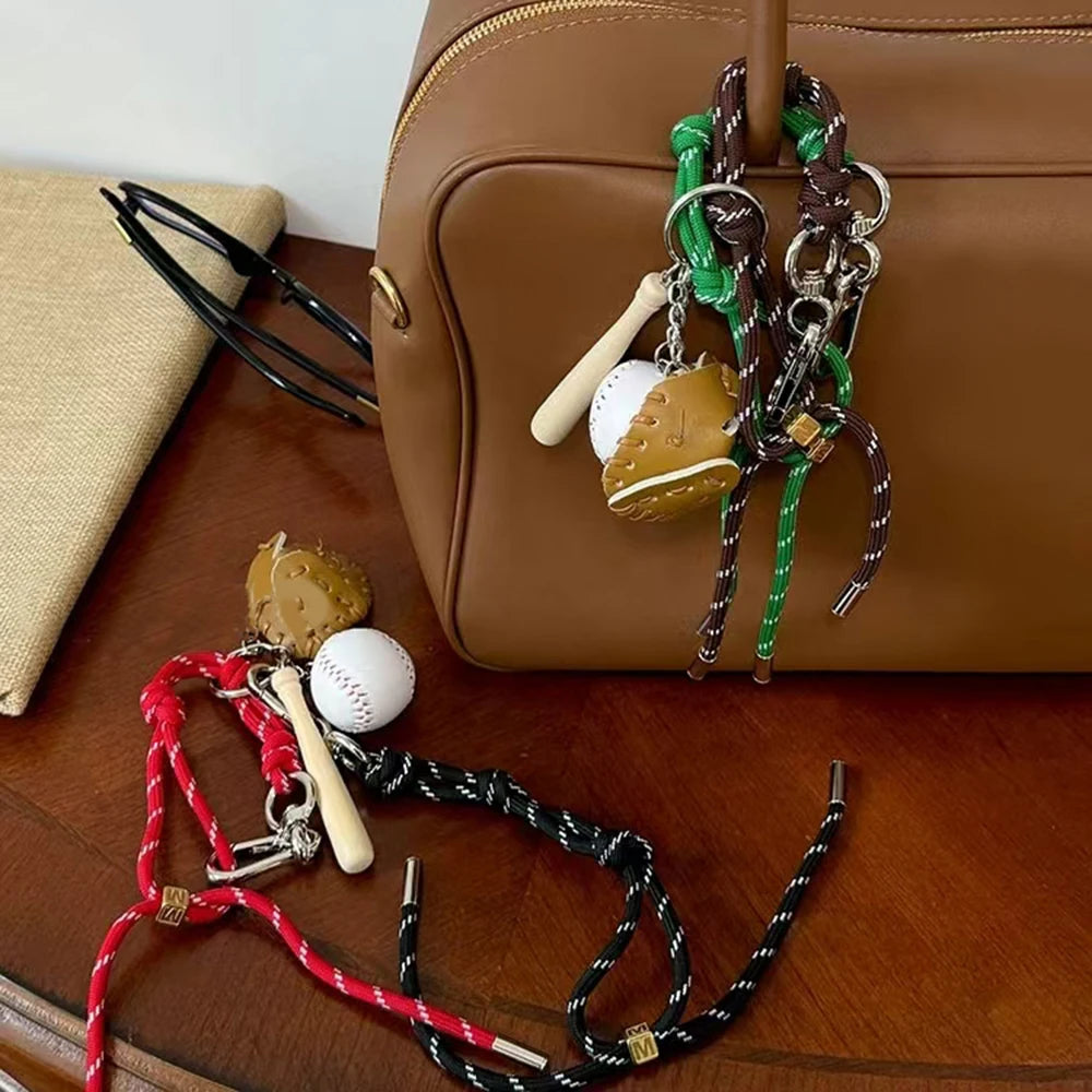 Alkuperäinen sulkapallokoristeinen avaimenperä